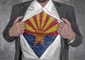 Business man show t-shirt flag of USA state Arizona rips open his shirt Royalty Free Stock Photo