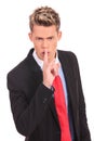 Business man showing silence gesture Royalty Free Stock Photo