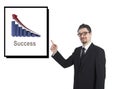 Business man showing success graphic