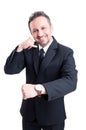 Business man showing watch and call me gesture
