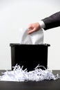 Business man shredding a document Royalty Free Stock Photo