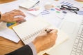 Business man signing a contract. Owns the business sign personally, director of the company, solicitor. Real estate agent holding Royalty Free Stock Photo