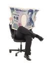 Business man sitting on a chair with japan currency