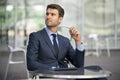 Business man sitting at coffee shop portrait Royalty Free Stock Photo