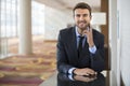 Business man sitting confident with smile portrait Royalty Free Stock Photo