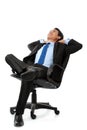 Business man sitting and relaxing on chair Royalty Free Stock Photo