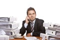 Business man sitting self confident on desk