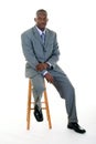 Business Man Sitting On Stool Royalty Free Stock Photo