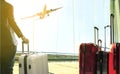 Business man and stack of traveling luggage standing in airport