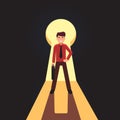 Business man standing in front of giant keyhole