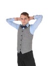 Business man standing with his hands behind his head Royalty Free Stock Photo