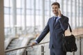 Business man standing walking talking on his cell phone Royalty Free Stock Photo