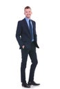 Business man stands with both hands in his pockets Royalty Free Stock Photo