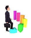 Business man stepping forward on growing 3d circular bar graph Royalty Free Stock Photo