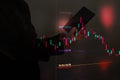 Business man or stock trader with graph chart fibonacci indicator