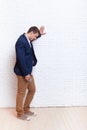 Business Man Stress Upset Hand On Wall Looking Down, Businessman Depression Pondering Royalty Free Stock Photo