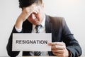 Business man stressing with resignation letter for quit a job packing the box and leaving the office , Resignation concept Royalty Free Stock Photo