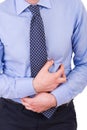 Businessman suffering from stomach pain.
