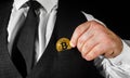 Business man in suit holding bitcoin Royalty Free Stock Photo