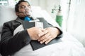 Business man with suit working with oxygen mask in the office. Sick man work in the office Royalty Free Stock Photo