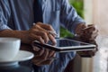 Business man using digital tablet computer and credit card for online shopping Royalty Free Stock Photo