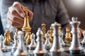 Business man take a king figure checkmate on the chess board game - strategy, management or leadership success concept Royalty Free Stock Photo