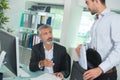 business man talking businessman in coworkers office Royalty Free Stock Photo