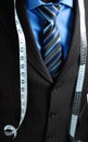 Business man with tape measure Royalty Free Stock Photo