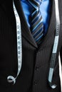 Business man with tape measure Royalty Free Stock Photo