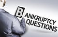 Business man with the text Bankruptcy Questions in a concept image