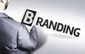 Business man with the text Branding in a concept image