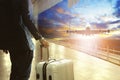 Business man and traveling luggage in airport terminal building Royalty Free Stock Photo