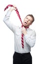 Business man. Man tying tie in studio Royalty Free Stock Photo
