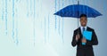Business man with umbrella and blue book against blue background and blue code Royalty Free Stock Photo