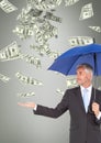 Business man under umbrella looking at money rain against grey background Royalty Free Stock Photo