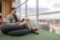 Business Man Using Cell Smart Phone Sit In Front Panoramic Window Businessman Coworking Center