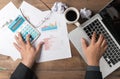 Business man using computer and calculator on table Royalty Free Stock Photo