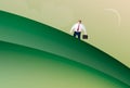 Business man walking up a hill Royalty Free Stock Photo