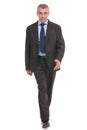 Business man walks to you Royalty Free Stock Photo