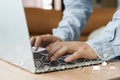 Business man wear grey shirt using laptop for digital online marketing on office desk. Business - finance technology concept.icon Royalty Free Stock Photo