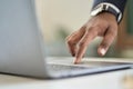 Business man wearing suit typing finger using laptop computer. Close up Royalty Free Stock Photo