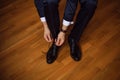 The man wears shoes Royalty Free Stock Photo