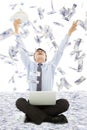 Business man winning a lottery with money rain Royalty Free Stock Photo