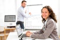 Business man and woman analysing stats while doing video conference Royalty Free Stock Photo