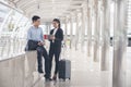 Business man and woman Dragging suitcase luggage Royalty Free Stock Photo