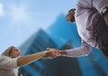 Business man and woman handshake . sky view. city. Royalty Free Stock Photo