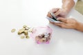 Business man woman hold collect coin in the row in Royalty Free Stock Photo