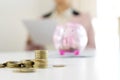 Business man woman hold collect coin in the row in Royalty Free Stock Photo