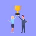 Business Man And Woman Holding Together Golden Cup Successful Businessman And Businesswoman Team Winners Royalty Free Stock Photo