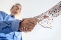 Business man and woman shaking hands Royalty Free Stock Photo